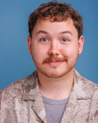 a man wearing a hawaiian shirt